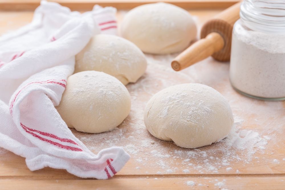 Homemade pizza dough portioning for perfect fermentation and baking with Alfa Forni pizza oven