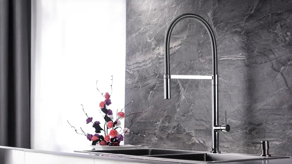 Stainless steel mixer tap from MVP Appliances, seamlessly blending in modern kitchen designs in Dubai, UAE.