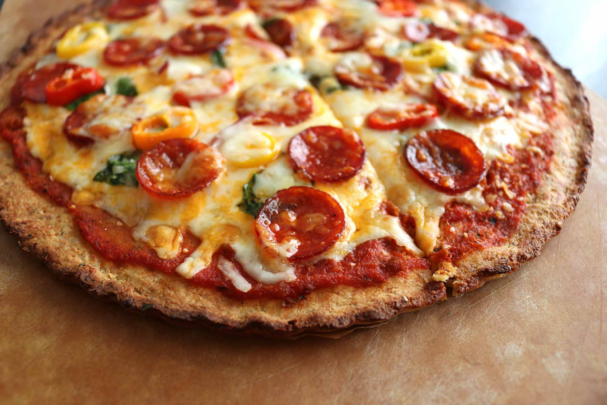 Homemade pizza with cheese and toppings from easy baking recipes for toddlers, perfect for family-friendly kitchen activities