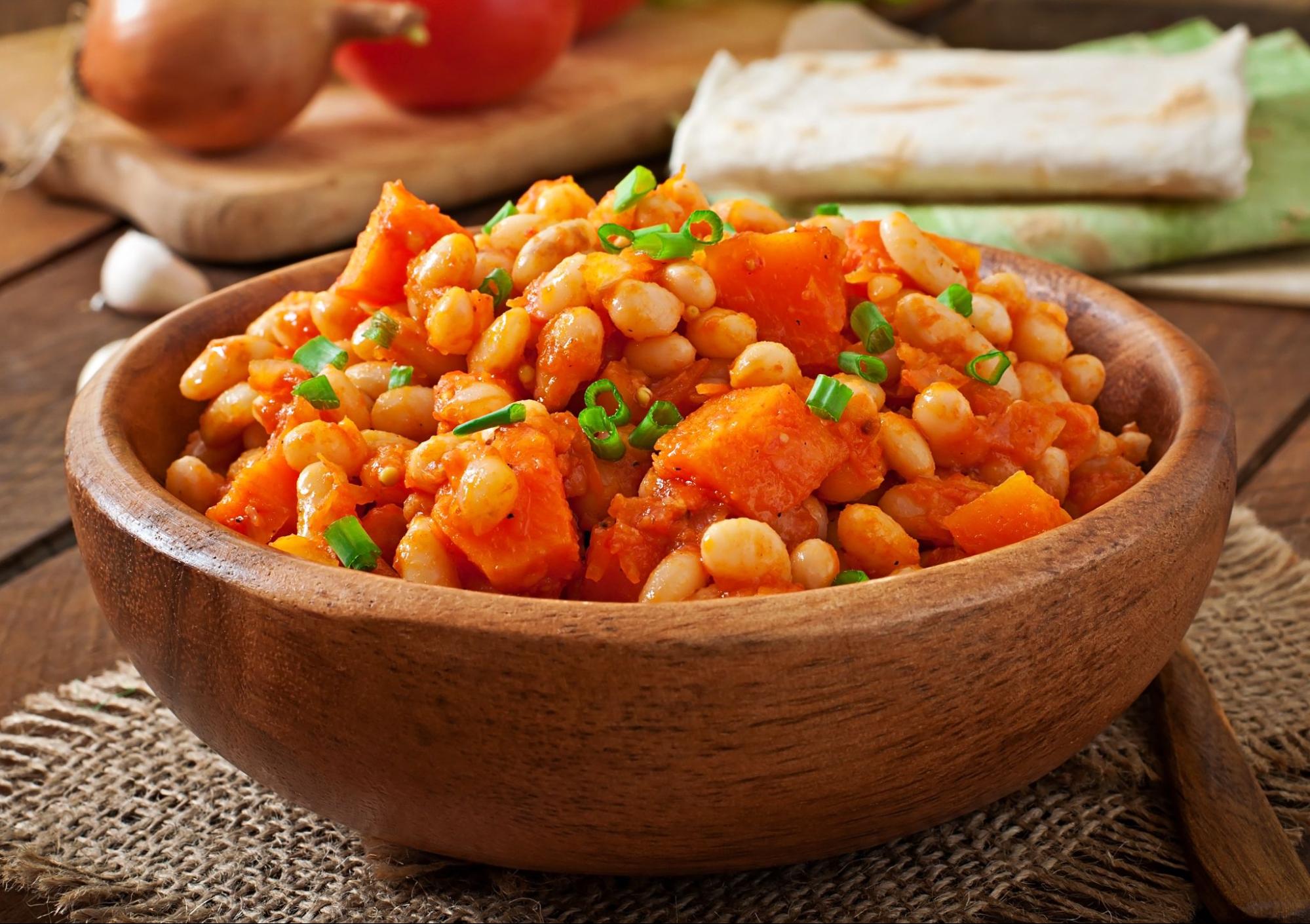 A hearty bowl of chickpea and potato curry in a spiced tomato gravy, served with rice or warm flatbread.